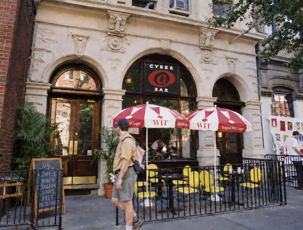 AI-cleaned image of the @Cafe cyber bar exterior in New York City