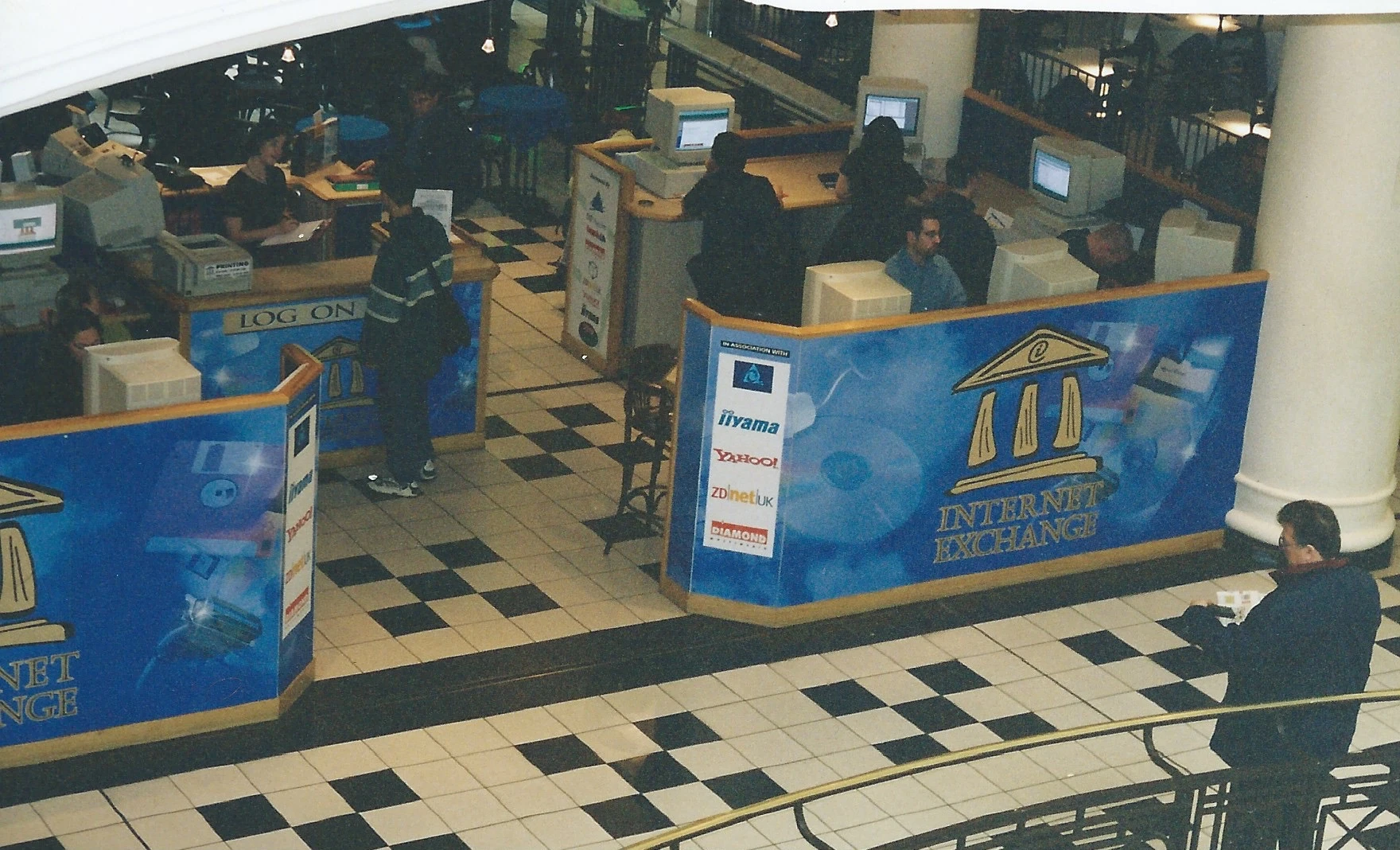 Internet Exchange interior with computer terminals and visitors